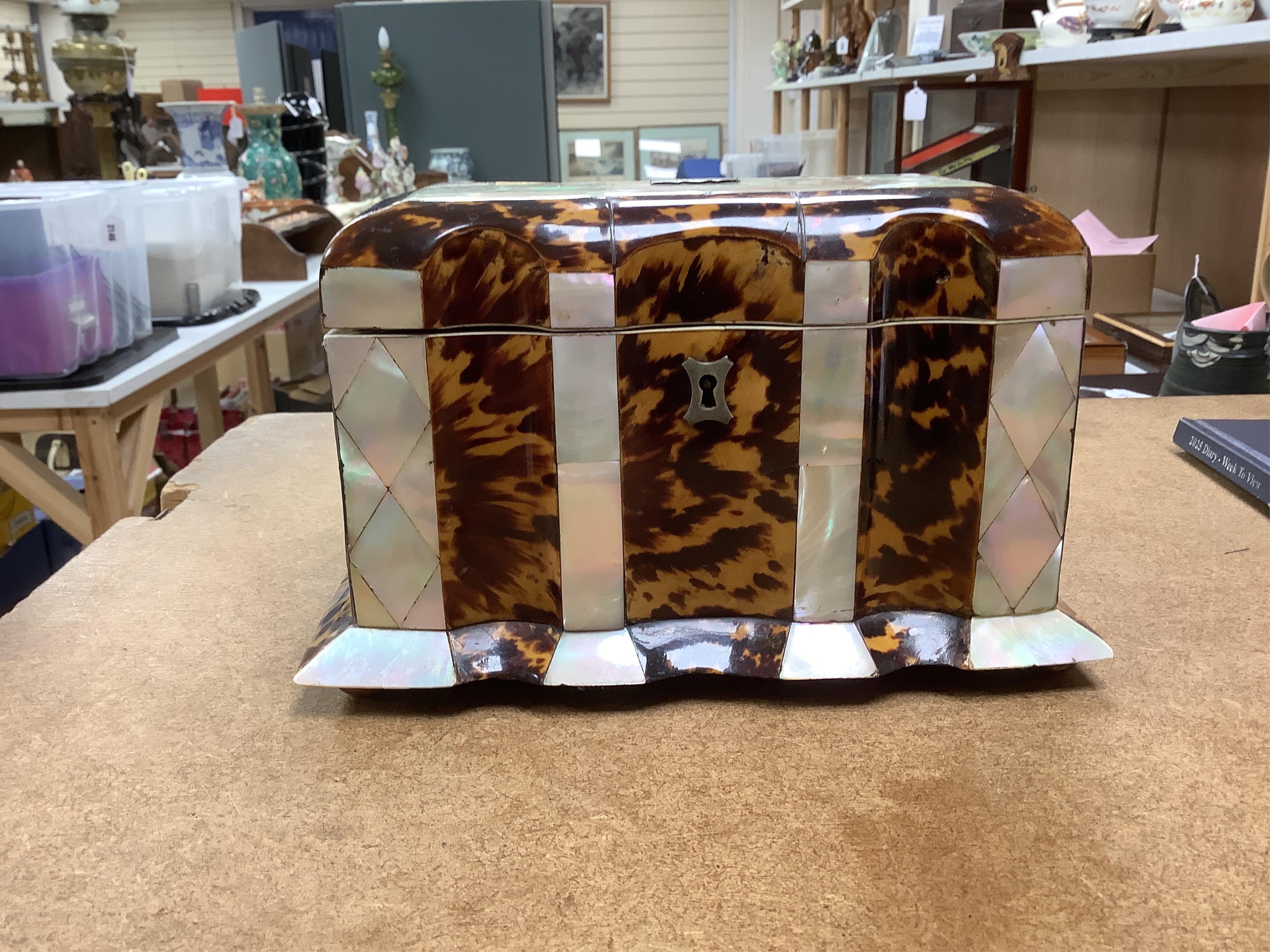 A mid 19th century decorative tortoiseshell and mother of pearl tea caddy, 20cm wide x 12.5cm high CITES Submission reference CXXC25Q1